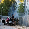 Israeli security forces try to extinguish a fire caused by a Hezbollah rocket launched from Lebanon near Moshav Avivim in the Galilee panhandle, Sept. 1, 2019. Photo by David Cohen/Flash90.