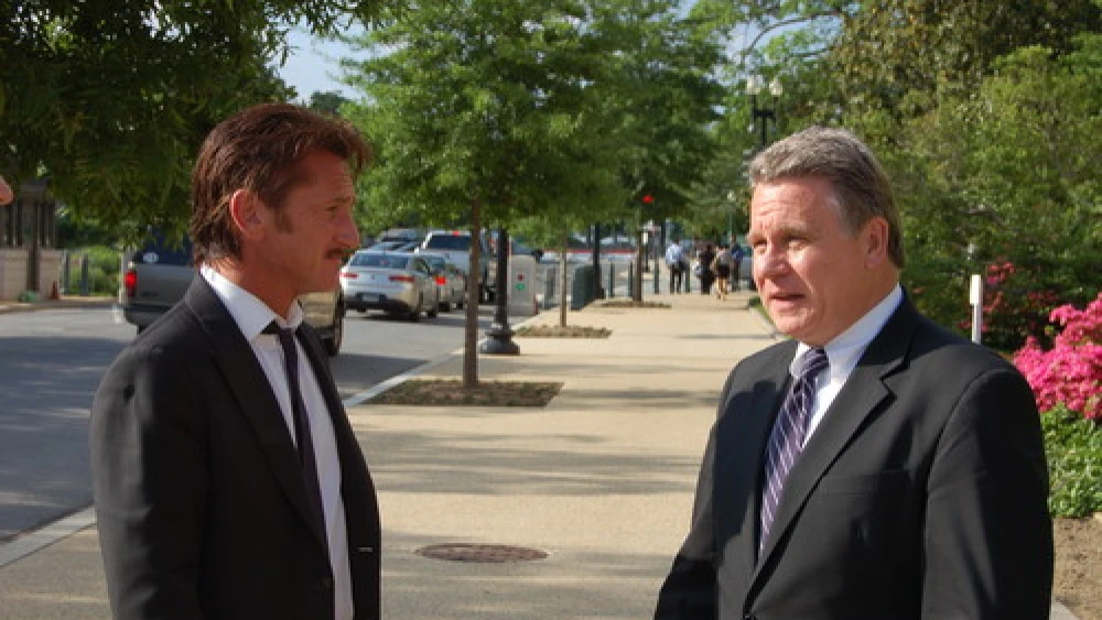 Click photo to download. Caption: Actor Sean Penn (left) with U.S. Rep. Chris Smith (R-NJ) after Penn testified on the case of Jewish prisoner Jacob Ostreicher at a May 20, 2013 congressional hearing organized by Smith. Credit: Office of U.S. Rep. Chris Smith.
