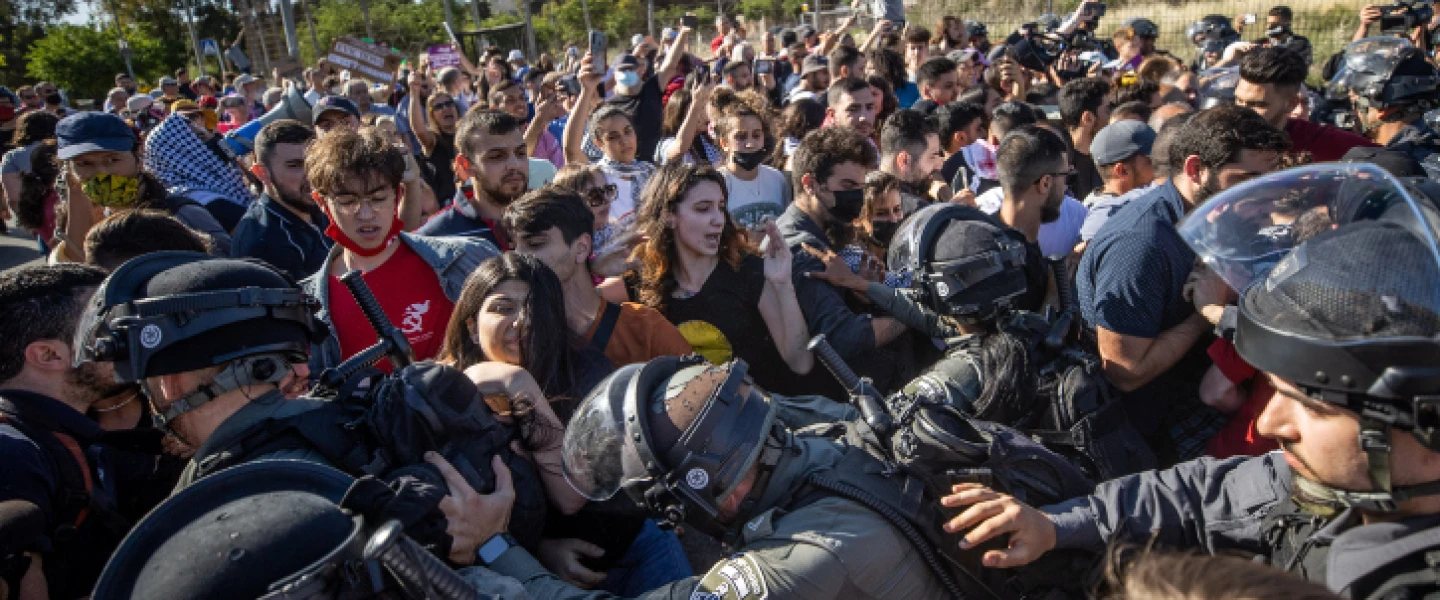 Israeli forces clash with protesters in Jerusalem's Sheikh Jarrah neighborhood on May 7, 2021. Photo by Yonatan Sindel/Flash90.