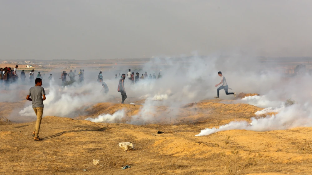 Palestinian protesters clash with Israeli forces near the Gaza-Israel border, east of Rafah in the southern Gaza Strip omn Sept. 13, 2019. Photo by Abed Rahim Khatib/Flash90.