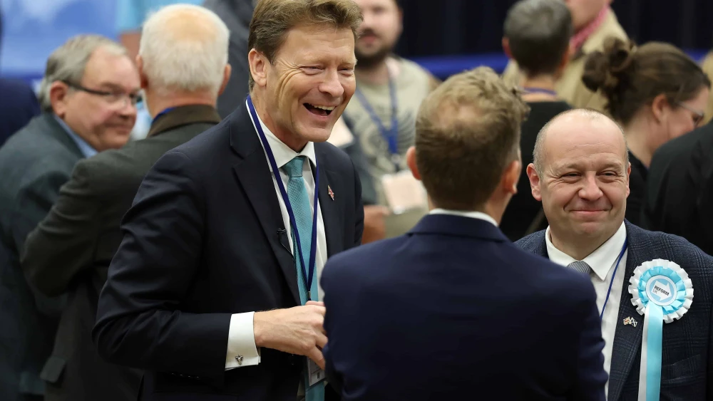 Reform UK Deputy Leader Richard Tice talks with candidate Ross Lambie at the Hamilton, Larkhall and Stonehouse by-election count in Hamilton, Scotland, on June 06, 2025. Photo by Jeff J Mitchell/Getty Images.