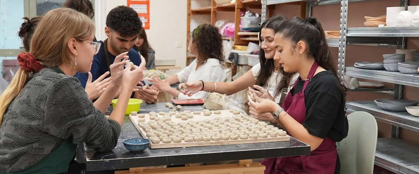 Participating youth at work in the Quantum program, creating custom items to be sold. Credit: Courtesy of Goldie Sternbuch.