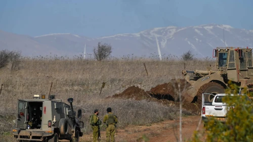 A bulldozer from the IDF's Engineering Corps operates near the Syrian border in the Golan Heights, Dec. 2, 2023. Photo by Michael Giladi/Flash90.