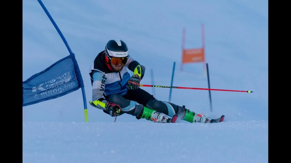 Barnabas Szollos, 23, is representing Israel at the 2022 Winter Olympics in Beijing. Source: YouTube Screenshot.
