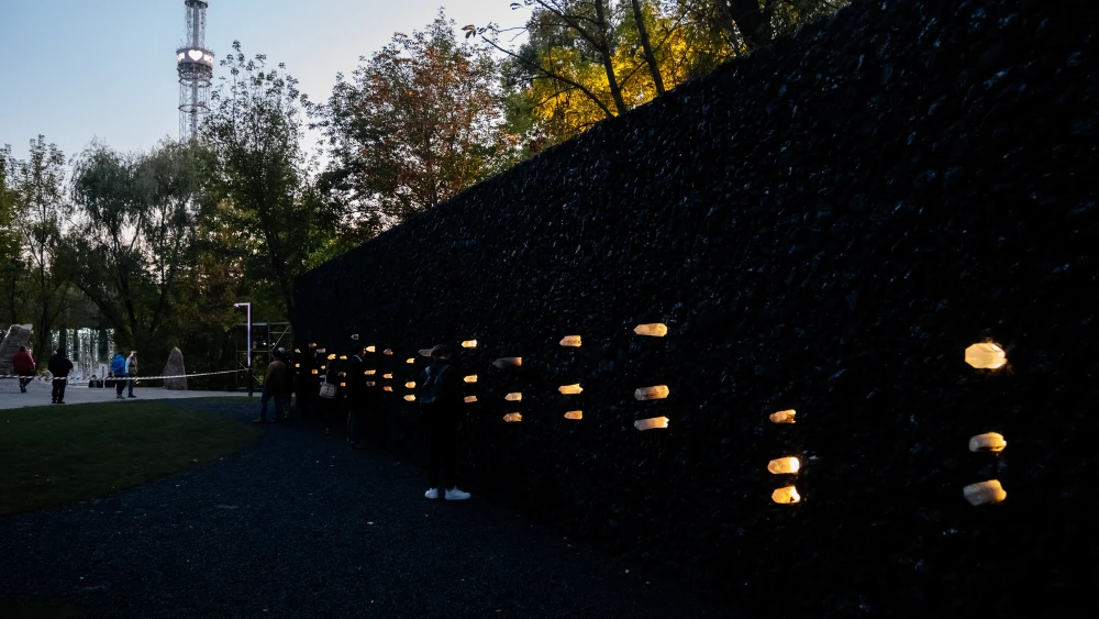 “The Crystal Wall of Crying,” an installation by sculptor Marina Abramovich at Babi Yar in Ukraine, is made of anthracite and rock quartz crystals that light up at night. Credit: Photographers Archive (The Gate).