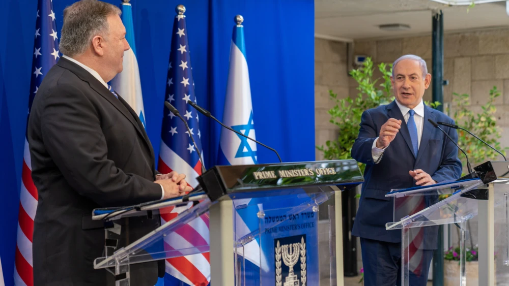 A handout photo of U.S. Secretary of State Mike Pompeo with Israeli Prime Minister Benjamin Netanyahu at the Prime Minister's Residence in Jerusalem on May 13, 2020. Photo by Ron Przysucha/U.S. State Department.