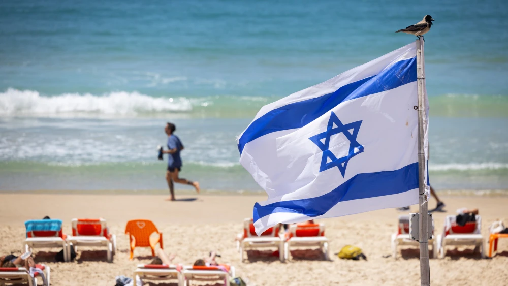 An Israeli flag on the beach in Tel Aviv, April 30, 2026. Photo by Miriam Alster/Flash90.