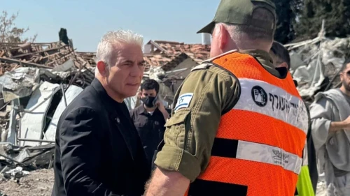 Israeli opposition leader Yair Lapid (Yesh Atid Party) visits the Beit Shemesh site where an Iranian ballistic missile killed nine Israelis, March 2, 2026. Credit: Yair Lapid/X
