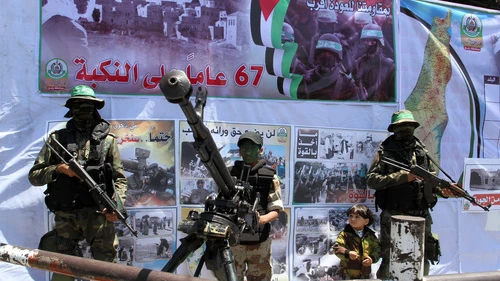 Hamas terrorists participate in a militaristic rally against Israel in the southern Gaza Strip on May 17, 2015. With the emergence of Islamic State supporters in Gaza, Hamas has a new rival in the territory in governs. Credit: Abed Rahim Khatib/Flash90.