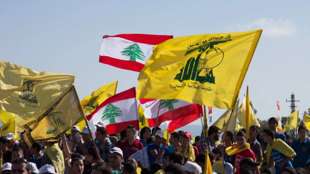 Hezbollah supporters in Bint Jbeil, Lebanon, in celebration of Liberation Day, May 25, 2014. Credit: Gabriele Pedrini/Shutterstock.