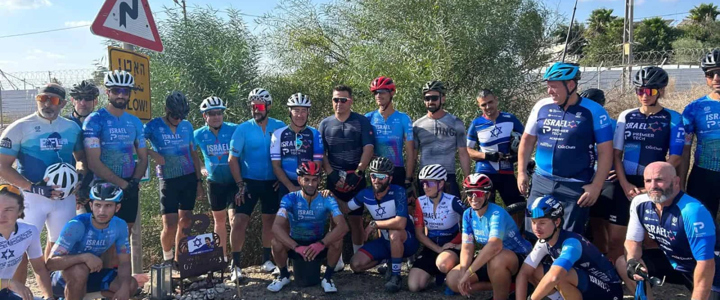 Riders at the memorial set up for Tomer Shpirer near Tzomet Mefalsim, Oct. 5. 2024. Photo: Amelie Botbol.