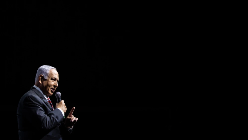 Israeli Prime Minister Benjamin Netanyahu speaks at the annual Jerusalem Conference of the "Besheva" group in Jerusalem, on March 14, 2021. Photo by Yonatan Sindel/Flash90.