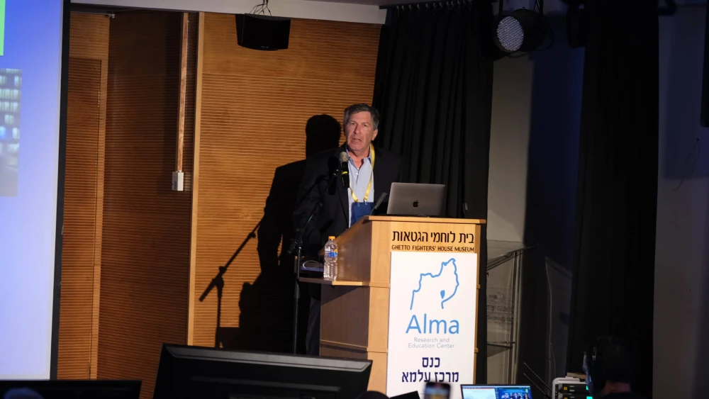 MEPIN Director Eric Mandel speaks at an event at Kibbutz Lohamei Hageta’ot on May 21, 2025. Credit: Courtesy of the Alma Center.