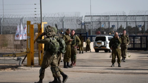 Israeli soldiers guard the Israeli side of the Quneitra Crossing on the Israel-Syria border in the Golan Heights on Oct. 15, 2018. Photo by Basel Awidat/Flash90.