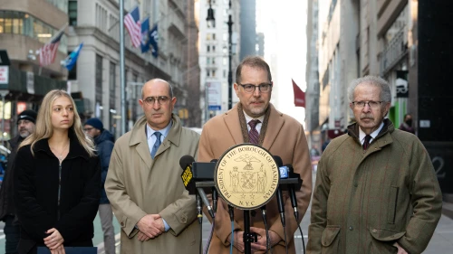 From left: Alison Comite, JCRC-NY CEO Gideon Taylor, Manhattan Borough President Mark Levine and WJC's Menachem Rosensaft stand on Lower Broadway, Jan. 27, 2023. Photo by Nir Arieli/WJC.