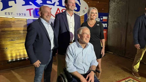 Texas Gov. Greg Abbott (seated) with congressional candidate Craig Goldman (rear, center) in Fort Worth, May 21, 2024. Credit: Greg Abbott/X.