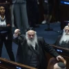 MK Yitzhak Goldknopf, government ministers and members of Knesset attend a plenum session and a vote on a bill to freeze arrests of Haredi draft evaders in the Knesset, July 14, 2026. Photo by Chaim Goldberg/Flash90.