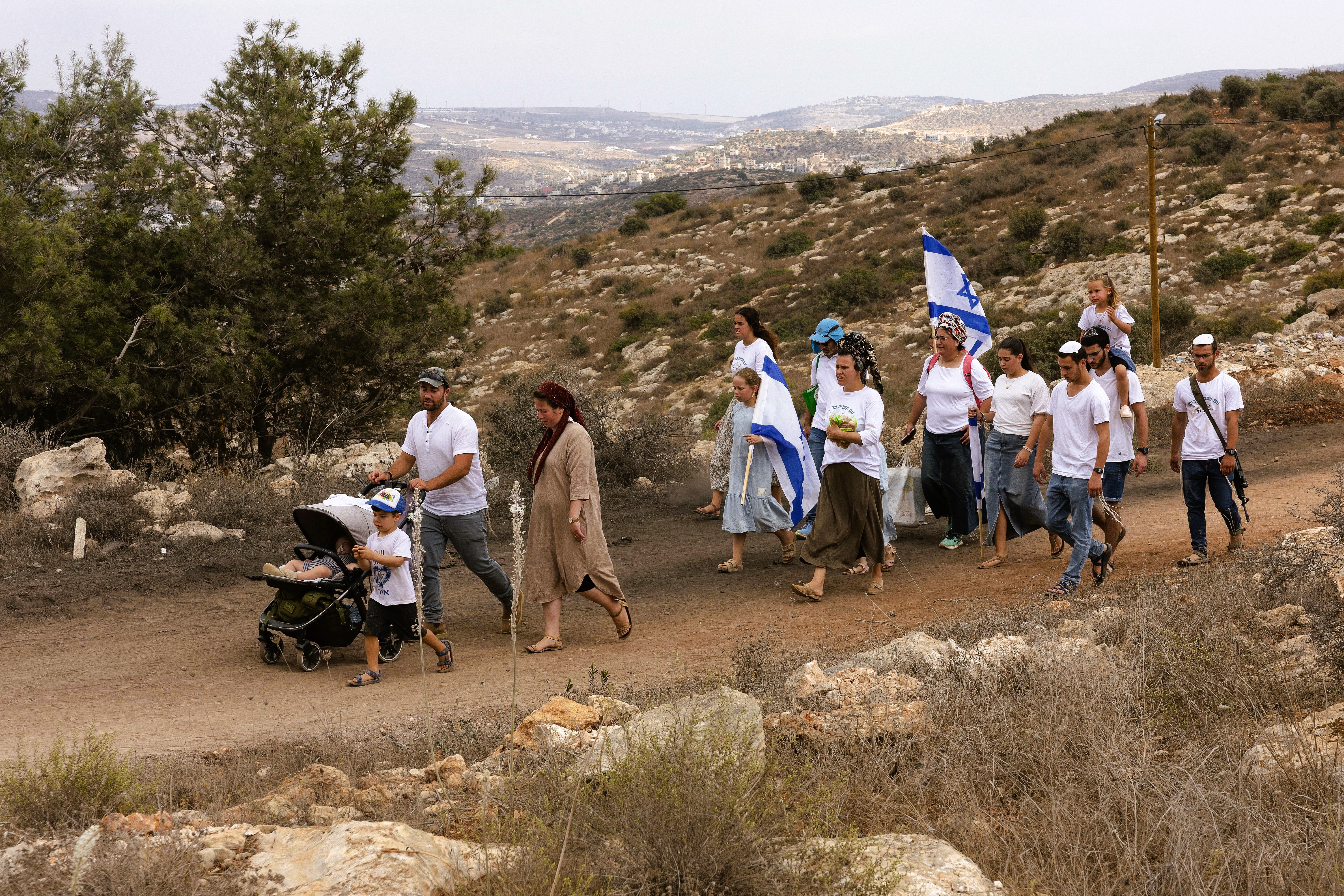 Jewish families take part in a march between the former settlements of Ganim and Kadim in the West Bank, which were evacuated as part of Israel’s 2005 disengagement plan, during the Jewish holiday of Sukkot, Sept. 30, 2026. Photo by Hilel Ben Or/Flash90